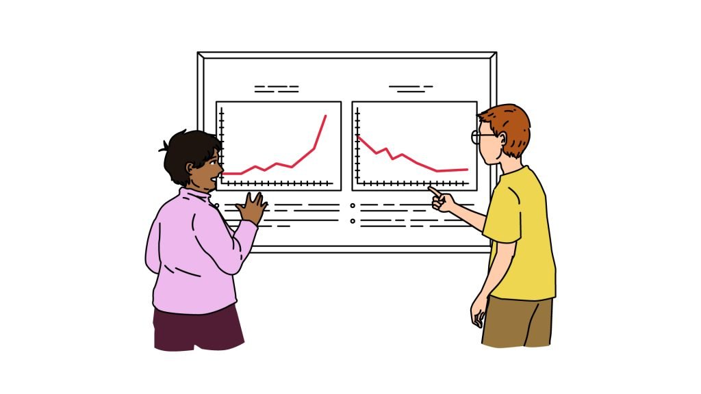 Two students examining results from  experiments